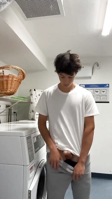 Cute face 18yo shows his rock hard uncut cock in the laundry