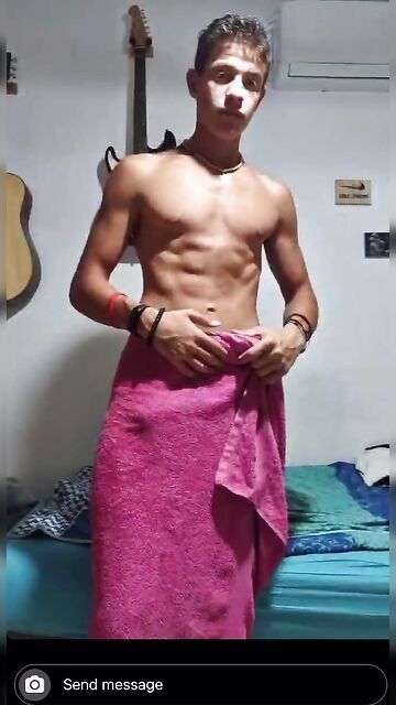 Handsome blond guy reveals an amazing physique and cock under the towel