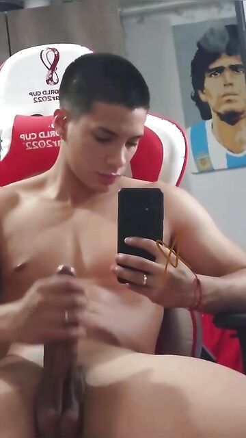 Naked soccer player with a giant straight cock jerks off at home filming with his phone