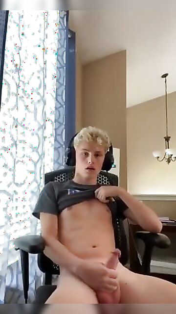 Horny youtube guy jerks off massaging his cock head while sitting in his gamer chair