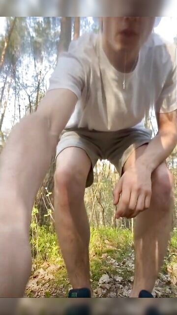 Very horny 19-year-old boy scout pisses with hard cock in the woods