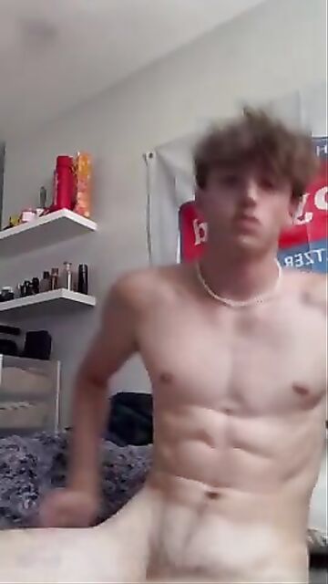 Hot muscled college student jerks off in bed